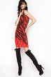 © EVGENY FREEONE - Brunette woman in fashion red dress