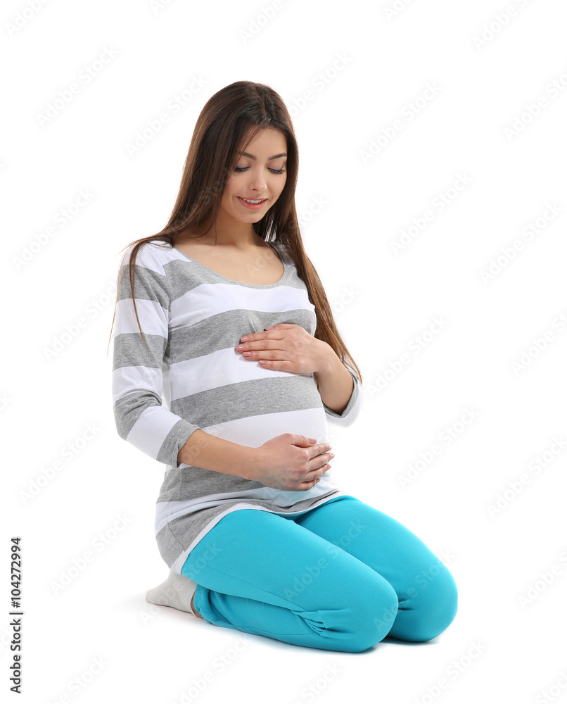 Beautiful pregnant woman isolated on white