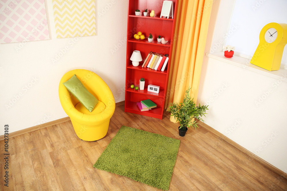 Modern living room interior with red bookcase and yellow chair