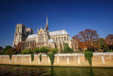 Fototapeta Paryż - Cathédrale Notre Dame de Paris, view of southern facade from the river Seine