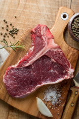 Wall Mural - Thick raw T-bone steak