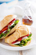 © fahrwasser - Croissant sandwich with brie, salad and strawberry