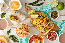Variety Of Mexican Cuisine Dishes On A Table