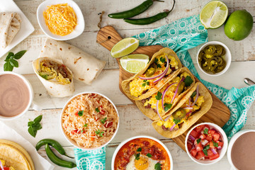 Variety of mexican cuisine dishes on a table