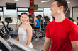 © AntonioDiaz - Young couple flirting at the gym