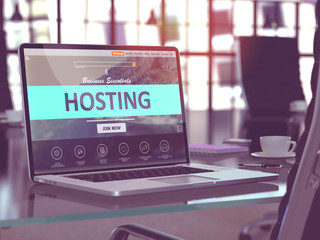 Poster - Modern Workplace with Laptop showing Landing Page with Hosting Concept. Toned Image with Selective Focus. 3D Render.