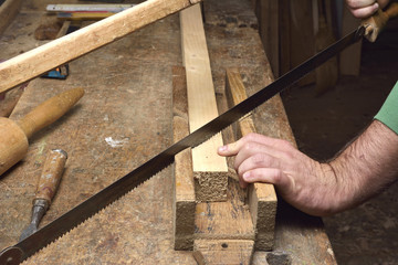 Wall Mural - carpenter working with plane on wooden