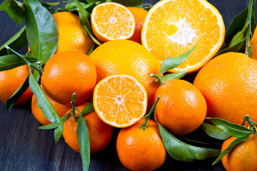 orange fruit and fresh tangerines oranges on wood