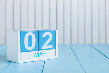 Wall Mural - May 2nd. Image of may 2 wooden color calendar on white background.  Spring day, empty space for text.  last spring month