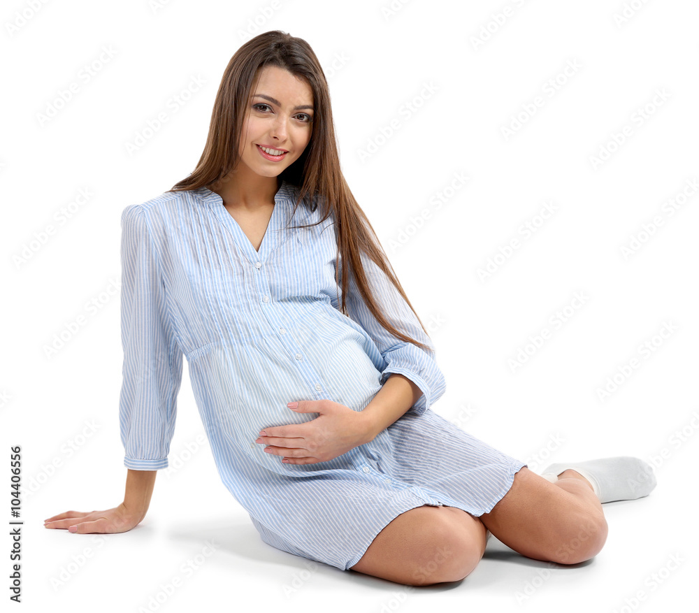 Beautiful pregnant woman isolated on white