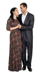 Wall Mural - Couple embrace, studio portrait on white. Dressed in black suit.