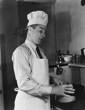 Man In Chef Hat And Apron Cooking 