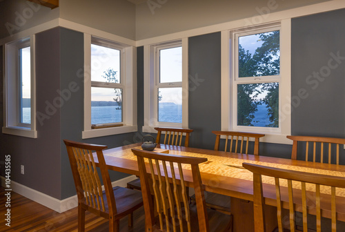 Dining Area With Wood Table And Chairs Painted Walls And