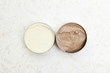 © triocean - Top view of white and brown beauty creams