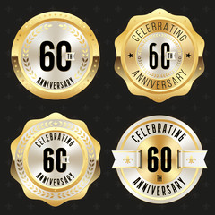 Collection of gold  60th anniversary badges on black background