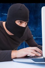 Poster - Hacker using laptop