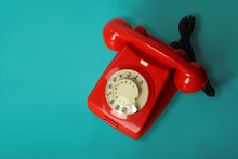Red Vintage Phone On A Blue Background