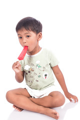 Wall Mural - cute little boy eatting ice cream