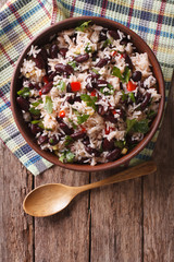 Wall Mural - Rice with red beans and vegetables in a bowl. vertical top view
