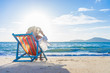 © Netfalls - Girl on a tropical beach with hat
