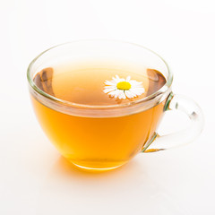 Wall Mural - Natural camomile tea in glass cup