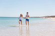 © Sergey Nivens - Romantic young couple on the beach