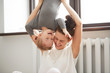 © WHstudio Leushin N - Happy family. Mother and son playing and smiling. Little boy having fun with his mother at home