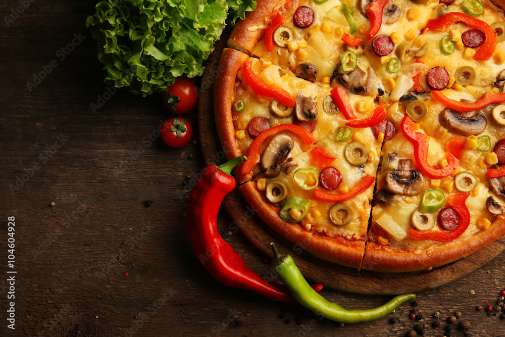Delicious sliced pizza with vegetables, close-up