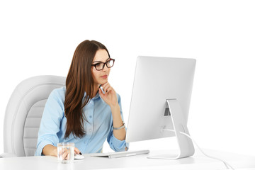 Wall Mural - A beautiful woman working at the office, isolated on white