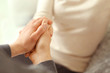 © Africa Studio - Man and woman holding hands closeup