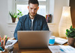 © Flamingo Images - Serious man working on laptop