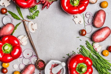 Wall Mural - Vegetarian food background with various organic vegetables, wooden spoon and  seasoning for tasty cooking. Top view composing, frame.  Healthy eating and diet food concept.