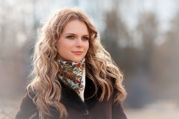 portrait  blonde women  in coat