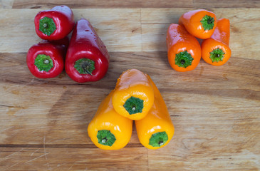 mini paprika on a wooden table