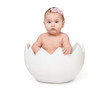 little cute baby in eggshell
