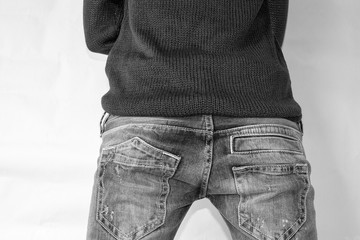 Back and buttocks of a female in black and white