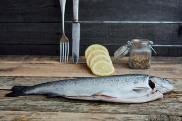 fresh fish on wooden table