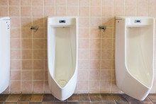 Urinals In An Old Building For Men