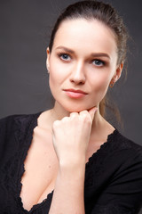 Wall Mural - Close up portrait of elegant brunette woman with nude make up. Emotions, emotional portraits