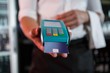 © WavebreakMediaMicro - Bartender accepting a credit card at bar counter