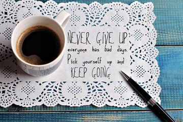 Wall Mural - Inspiration motivation quotation  Never give up and keep going and cup of coffee Success concept