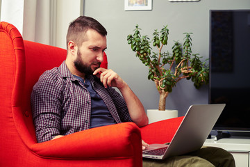 Wall Mural - man working with laptop at home