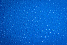 Background Of Water Drops On Blue