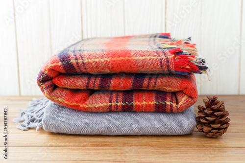 Juliste Winter fashion clothing and blanket with wood background