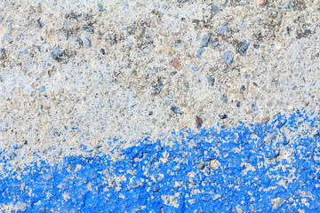 Cement wall with stain of blue oil color, cement texture backgro