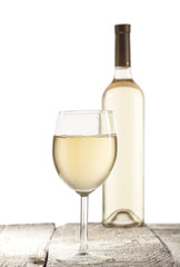 Wall Mural - Wineglass and bottle with white wine