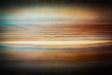 Blur Abstract Background With Blue, Orange And Black.
