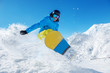 Active snowboarder jumping