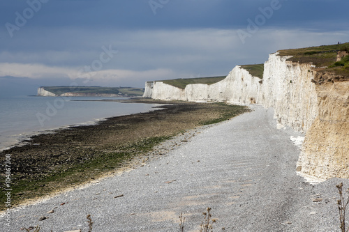 Fotografie, Obraz The cliffs and lighthouse at Beachy Head on the south coast of Eastbourne