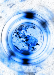 Poster - Planet earth in light circle, Cosmic Space background. Computer collage. Earth concept. Elements of this image furnished by NASA.